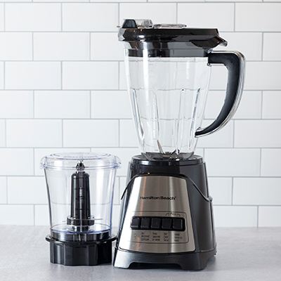 HAMILTON BEACH<sup>&reg;</sup> Multiblend Blender and Chopper - All it takes is a press of a button to get smooth and delicious results with the Hamilton Beach Multiblend Blender and Chopper. This 700-watt peak power blender comes with a 40 oz. glass pitcher and a 3 cup food chopper combined into 1 appliance. The Wave Action System is designed to continually force the mixture down into the blades for consistently smooth results. (4) Blending buttons with (12) blending functions to make milkshakes, crush ice and food prep such as puree, device, chop and grate. 