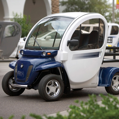 GEM<sup>®</sup> e2 Electric Car - Economic and environmentally friendly, this two-passenger vehicle is ideal for the short trips you make every day. Six 12-volt flooded electrolyte batteries provide a range of up to 35 miles on a charge.