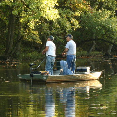 JON BOAT - Perfect for hunting, fishing, or trolling, this 15-foot Jon Boat includes a 15HP motor and trailer.  
