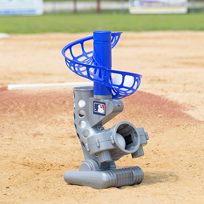 FRANKLIN<sup>&reg;</sup> Electronic MLB<sup>&reg;</sup> Pitching Machine - Your little slugger can improve batting skills and hand-eye coordination with this electronic pitching machine.  Balls pitch every 7 seconds, red light indicates pitching movement and height can be adjusted for pitches.  6 plastic baseballs included.  Ages 5 and up.