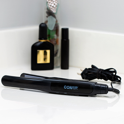 CONAIR<sup>&reg;</sup> Satin Finish 3/4&quot; Ultra Slim Ceramic Straightener - Reduce flyaways and leave hair silky smooth and super straight with this sleek flat iron. Features 25 variable heat settings, auto shut-off, ergonomic handle and 30-second instant heat up. 