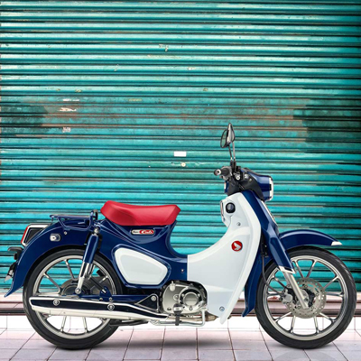HONDA<sup>&reg;</sup> Super Cub C125 ABS - Great for day-to-day transportation or just riding enjoyment, the Super Cub C125 ABS celebrates the legendary Super Cub heritage. Features a air-cooled single-cylinder four-stroke engine, helical primary gear and high-quality crank-journal bearing for noise reduction, steel frame, high-density urethane seat and more. LED lighting adds a modern touch. One-channel ABS standard.
